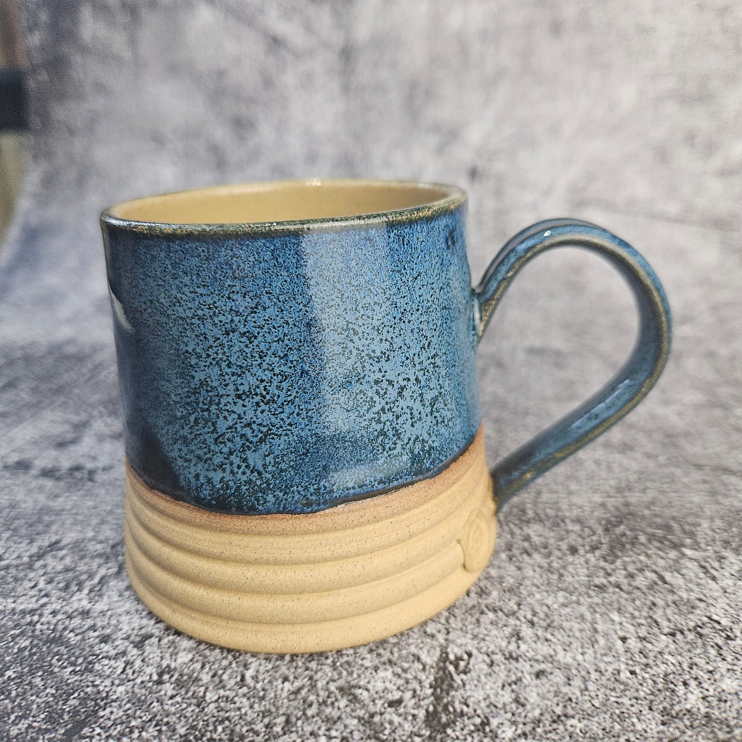 Speckled Blue ribbed mug, short.