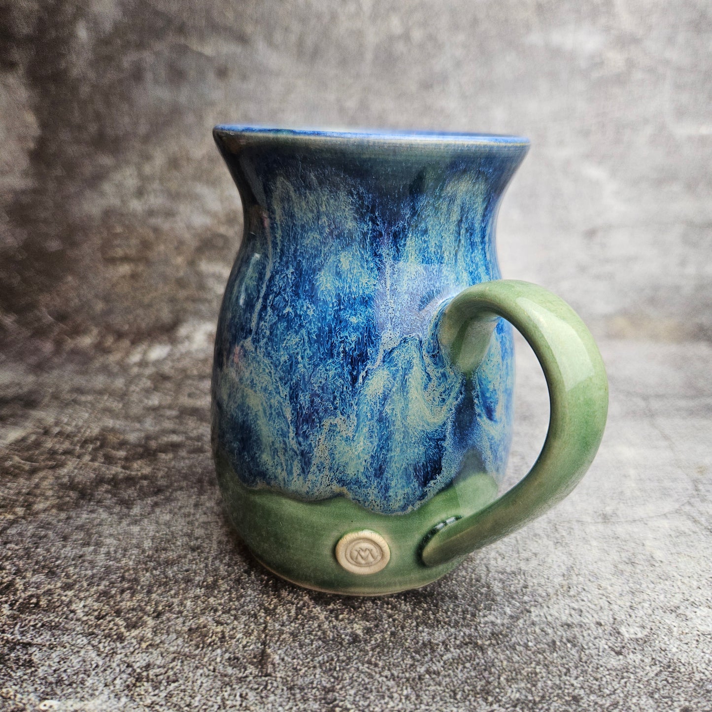 Flowing ice, blue over green mug