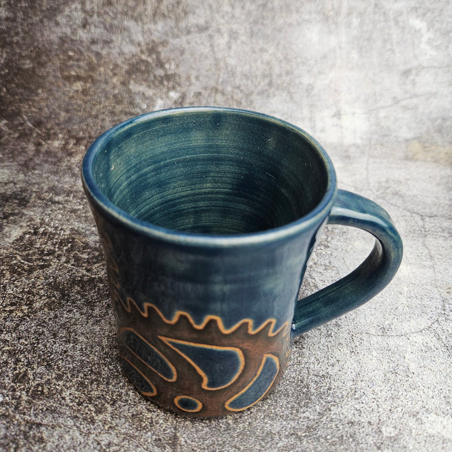 Cogs on blue mug
