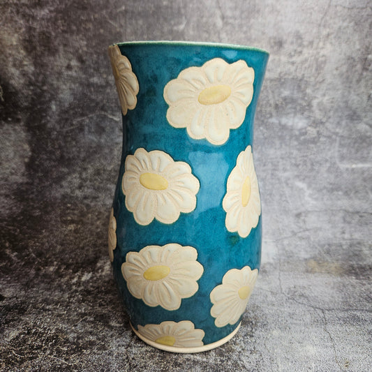 Daisy on teal vase