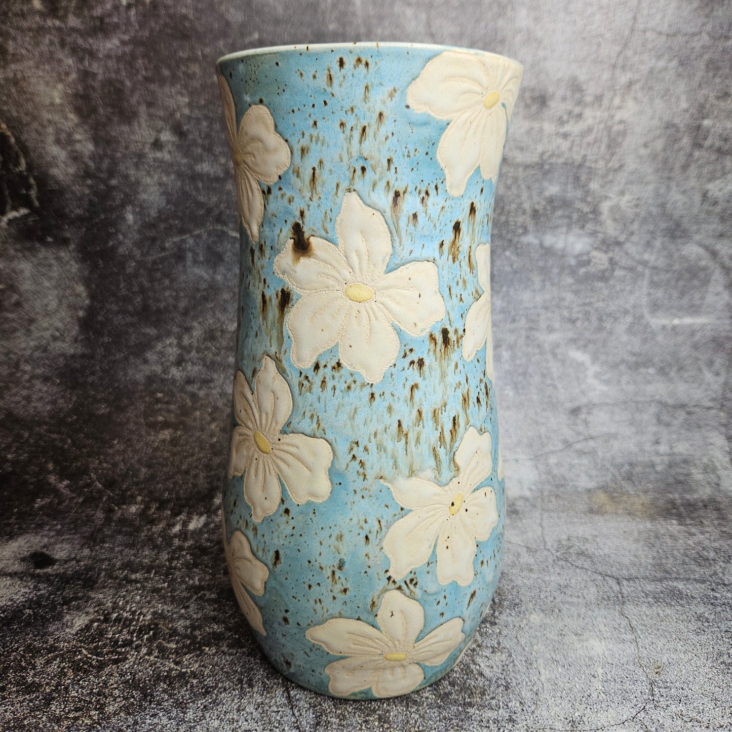 Lilies on baby blue vase