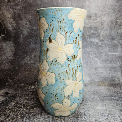 Lilies on baby blue vase
