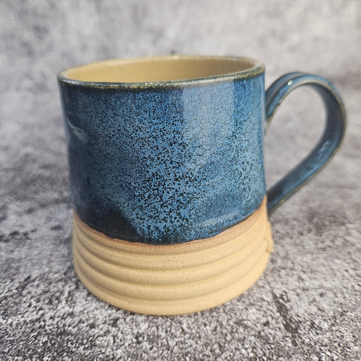 Speckled Blue ribbed mug, short.