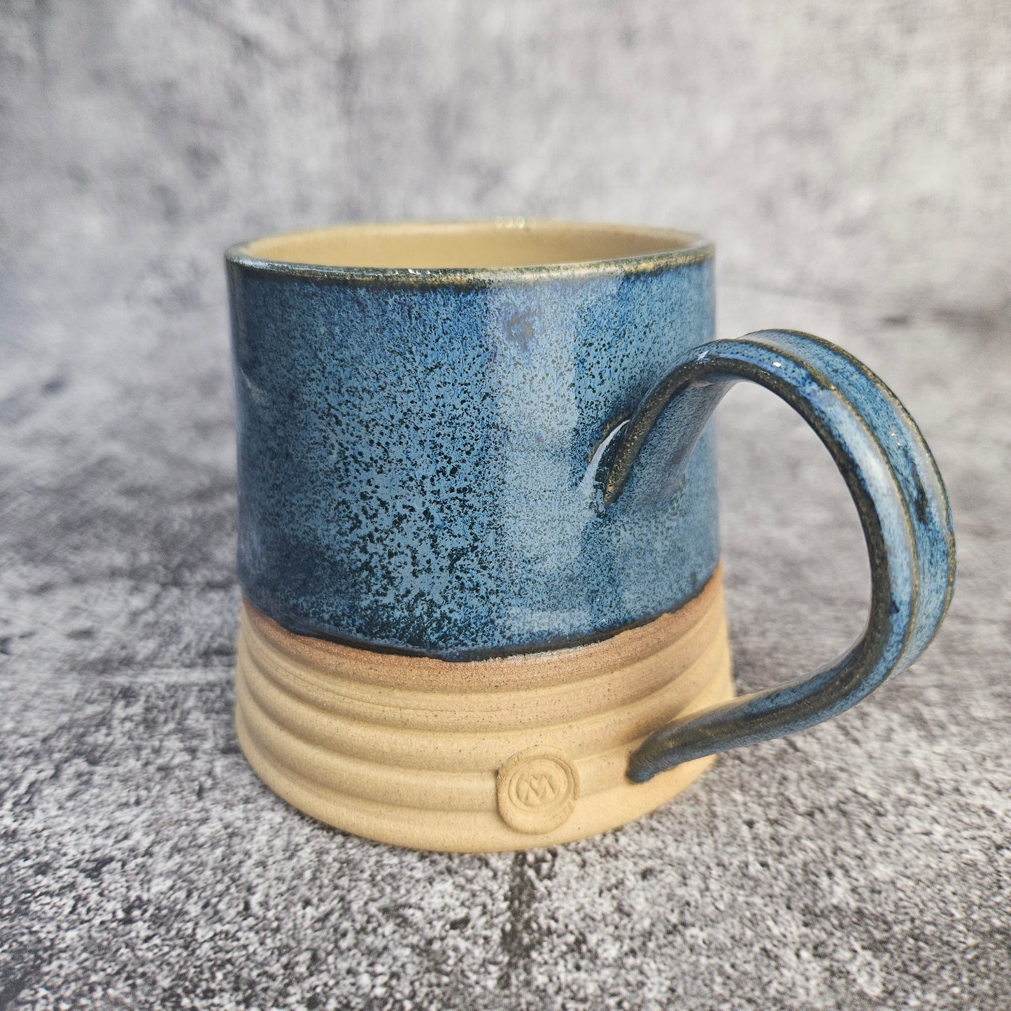 Speckled Blue ribbed mug, short.