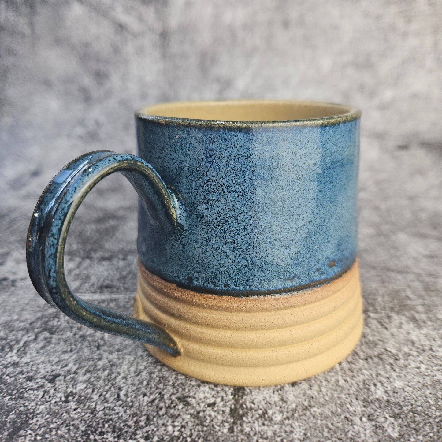 Speckled Blue ribbed mug, short.