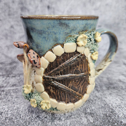 Einhard Puddlefoot's abode. Hobbit door mug.