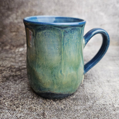 Flowing ice, green over blue mug