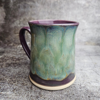 Flowing ice, green over purple mug with ear shape handle